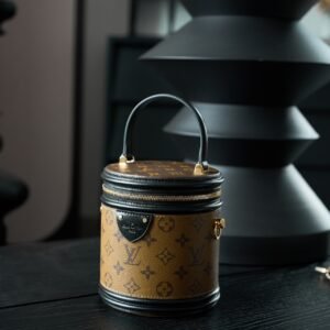 Cannes Monogram Reverse Canvas Handbag